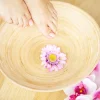 Legs of young woman with beautiful pedicure