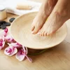 Legs of young woman with beautiful pedicure