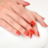 Manicure - Beautiful manicured woman's nails with red nail polis