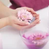 Nail Care. Closeup Of Beautiful Woman Hands With Natural Nails In Beauty Salon.
